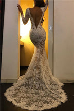Vestido de fiesta blanco largo de sirena con escote en V, tul y encaje, con abertura.
