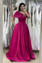 Robe de bal longue en satin, coupe trapèze, épaules dénudées et poches