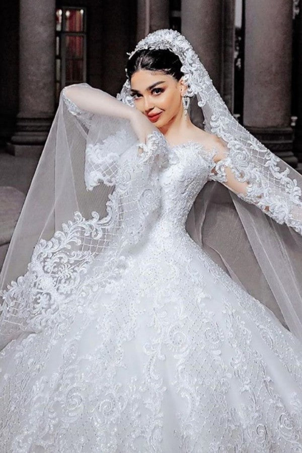 Vestido de novia largo de princesa con mangas, tul, cuentas, apliques de encaje y tul.