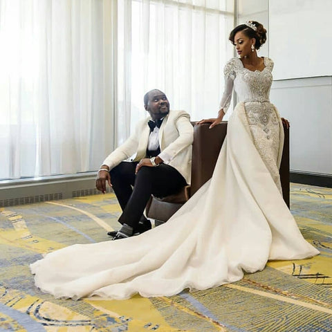 Vestidos de novia de sirena de manga larga con apliques de encaje y cuentas, con sobrefalda.