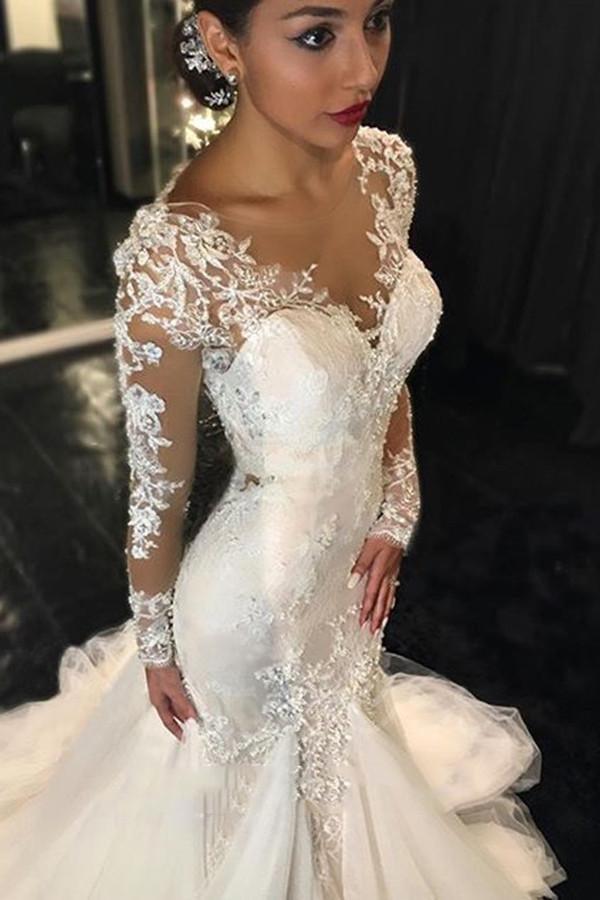 Robe de mariée ivoire à manches longues et traîne courte, ornée d'appliqués de dentelle WD037