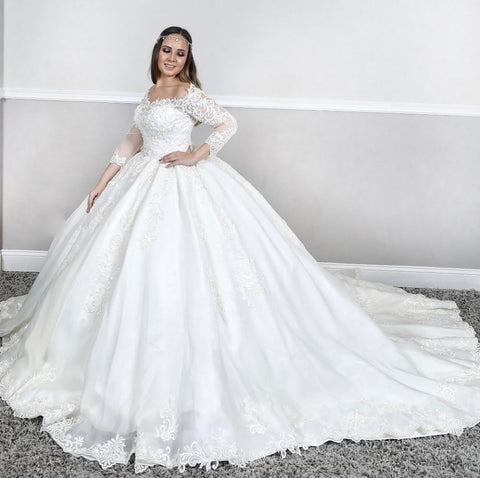 Vestido de novia princesa de encaje de manga larga con escote cuadrado y corte abullonado