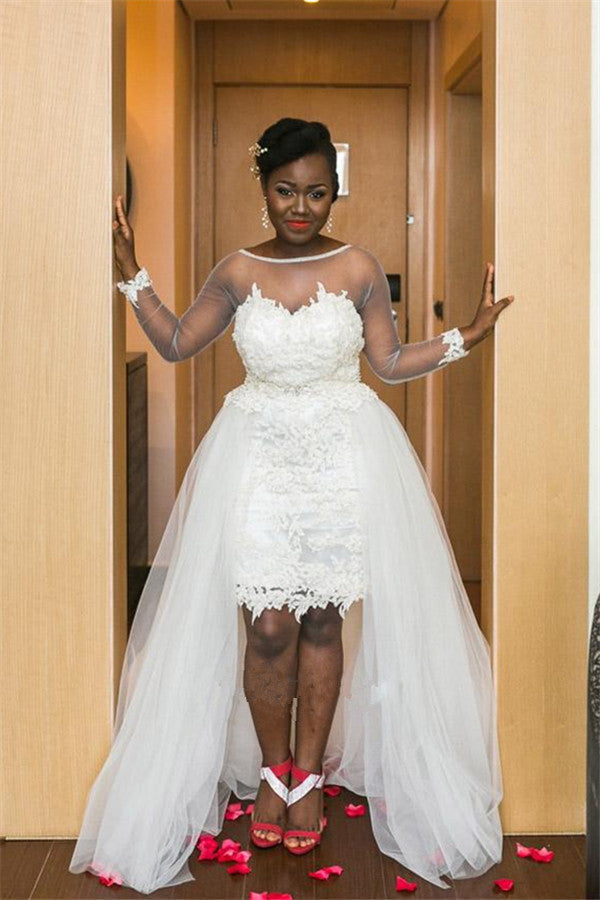 Robe de mariée en tulle transparent à manches longues avec surjupe en dentelle