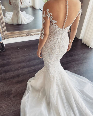 Vestido de novia de sirena de encaje con escote en V y mangas largas en oferta