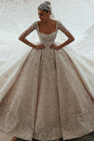 Vestido de novia de encaje de corte A, manga larga y lujosa cola