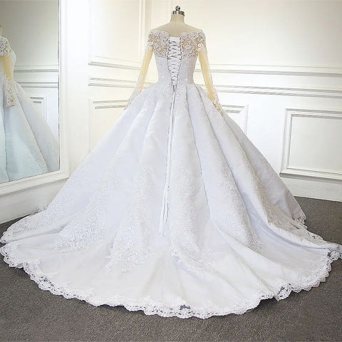 Vestido de novia de encaje blanco de corte princesa, manga larga y corte en A