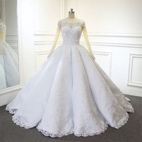 Vestido de novia de encaje blanco de corte princesa, manga larga y corte en A
