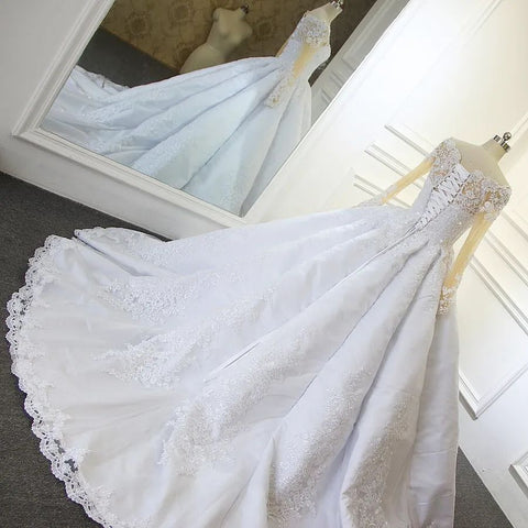 Vestido de novia de encaje blanco de corte princesa, manga larga y corte en A