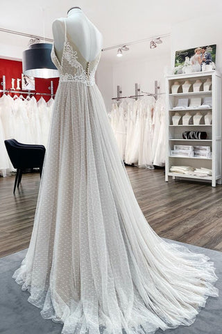 Robe de mariée de luxe longue en tulle, col V, dos nu et dentelle, coupe trapèze, col en V et luxueuse
