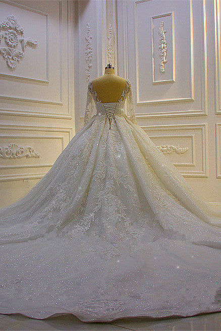 Robe de mariée longue de bal luxueuse avec applications de dentelle et manches