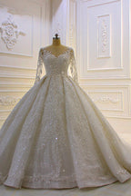 Robe de mariée longue de bal luxueuse avec applications de dentelle et manches