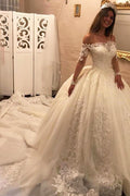 Robe de mariée longue de luxe avec épaules dénudées, traîne chapelle, appliques et manches