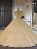 Vestidos de novia largos de lujo, estilo princesa, con hombros descubiertos, encaje y tul, adornados con pedrería.