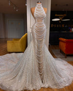 Vestido de novia largo de sirena de lujo, sin mangas, con cuentas y perlas, corte halter y bordado