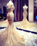 Robe de bal longue sirène de luxe en tulle ornée de perles et col en V, coupe sirène.