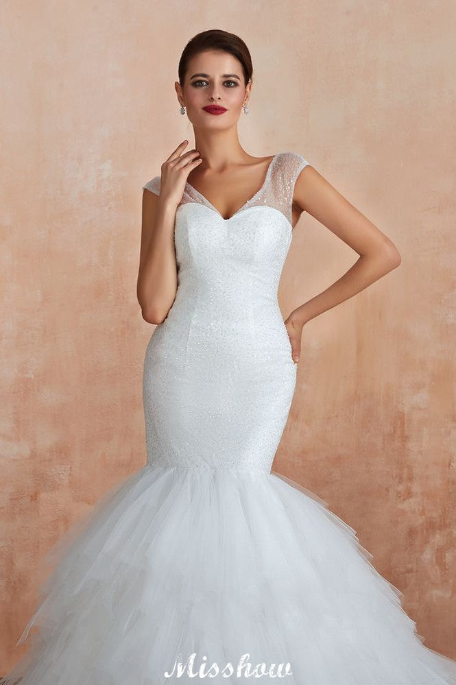 Robe de mariée blanche de luxe à col en V, manches courtes, laçage et sequins, idéale pour la plage.