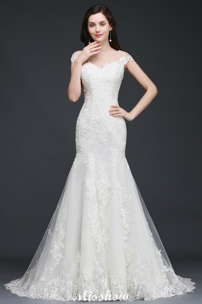 Robe de mariée sirène en tulle et dentelle, ornée de bijoux