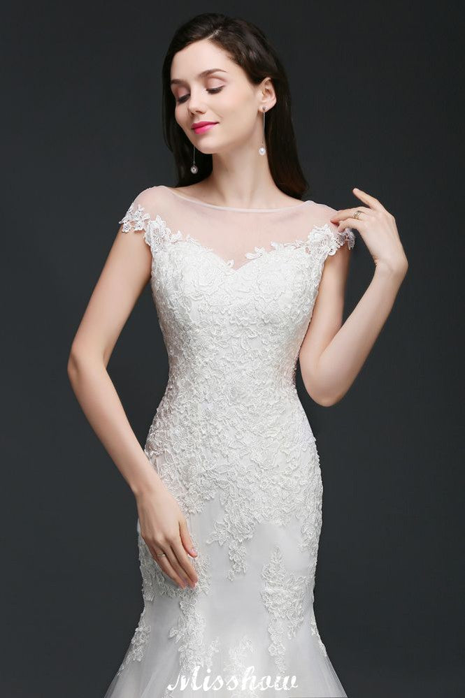 Robe de mariée sirène en tulle et dentelle, ornée de bijoux