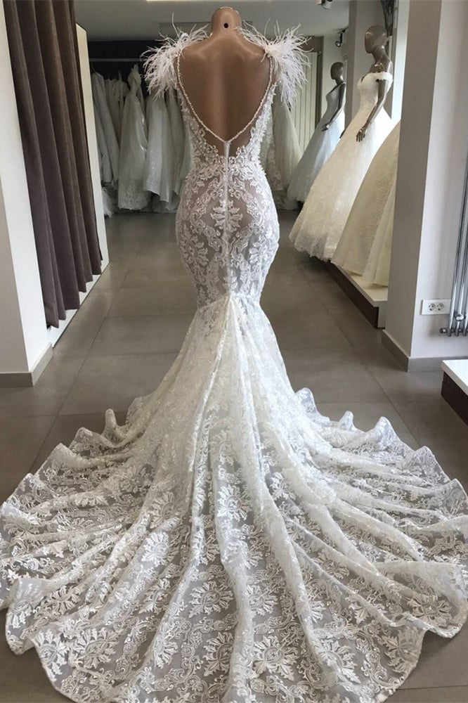Robe de mariée sirène en dentelle et cristaux avec collier et plumes