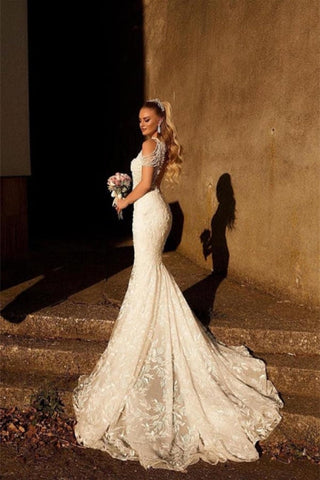 Vestido de novia de sirena con apliques y cuentas