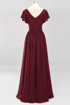 Robe de demoiselle d'honneur élégante en mousseline de soie, coupe trapèze, col en V, manches courtes et ceinture à nœud. Longue robe de soirée.