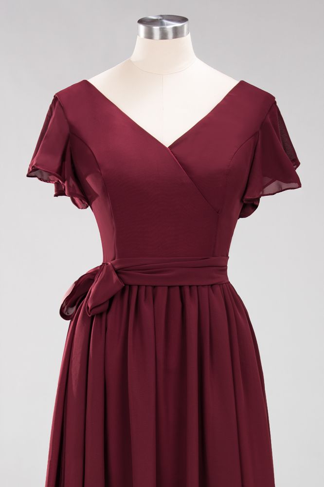 Robe de demoiselle d'honneur élégante en mousseline de soie, coupe trapèze, col en V, manches courtes et ceinture à nœud. Longue robe de soirée.