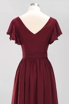Robe de demoiselle d'honneur élégante en mousseline de soie, coupe trapèze, col en V, manches courtes et ceinture à nœud. Longue robe de soirée.