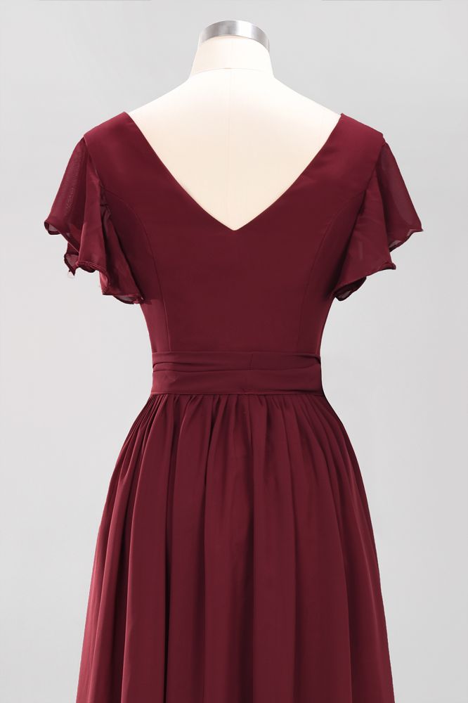 Robe de demoiselle d'honneur élégante en mousseline de soie, coupe trapèze, col en V, manches courtes et ceinture à nœud. Longue robe de soirée.