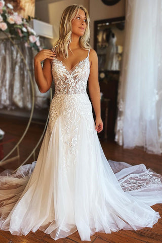 Vestido de novia moderno largo de corte A con tirantes finos, encaje y sin mangas