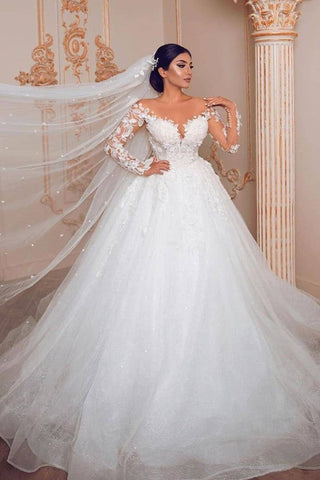 Vestido de novia largo y modesto de princesa, de tul y encaje, con mangas.