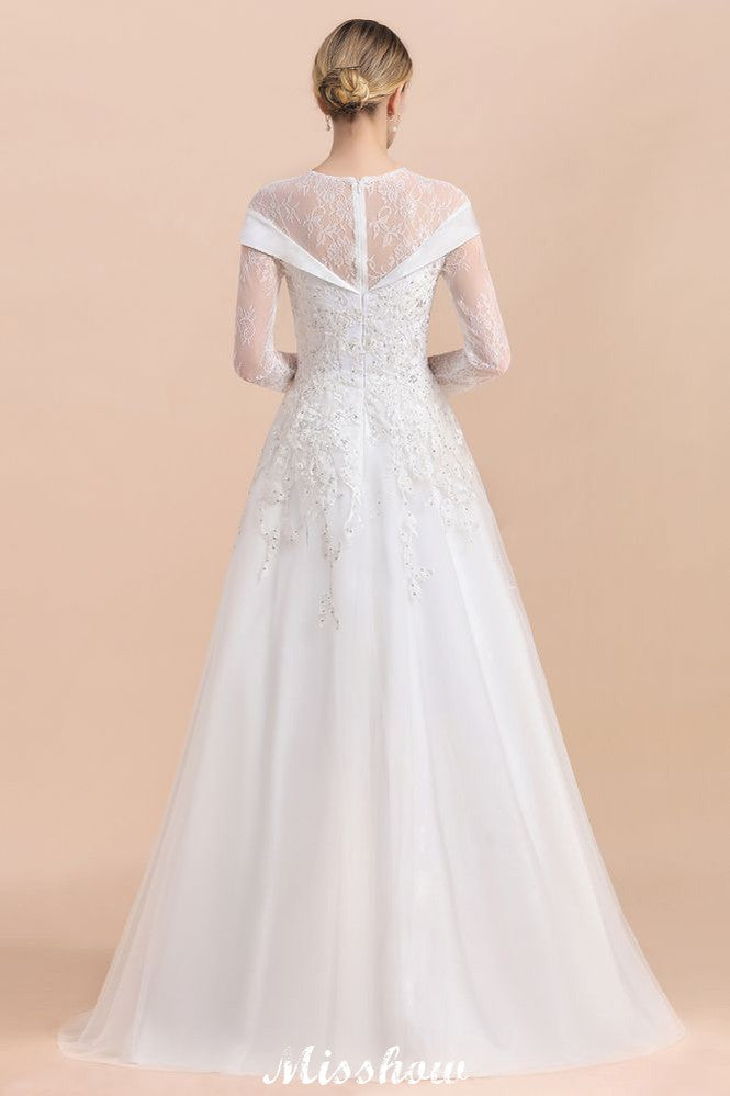Vestido de novia sencillo con apliques de cuentas blancas, manga larga y largo hasta el suelo.
