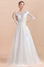 Vestido de novia sencillo con apliques de cuentas blancas, manga larga y largo hasta el suelo.