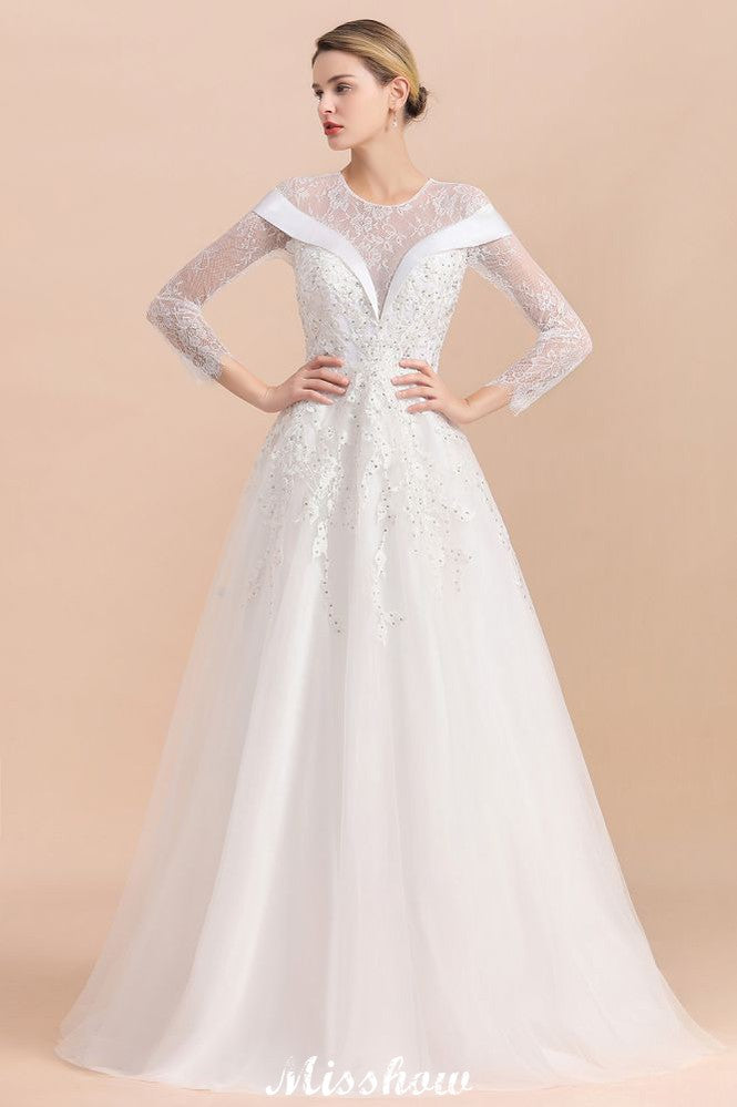 Vestido de novia sencillo con apliques de cuentas blancas, manga larga y largo hasta el suelo.