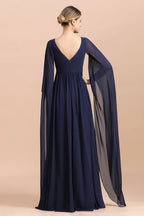 Vestido de gasa azul marino de manga larga con volantes para la madre de la novia (disponible online)