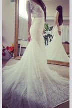 Vestido de novia largo de encaje, elegante, sin mangas, estilo sirena, con escote pronunciado en la espalda y espalda en V. 