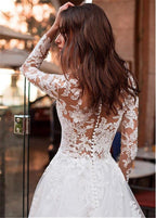 Baoleely Attractive Tulle Jewel Neckline See-through Bodice A-line Wedding Dress With Lace Appliques & Beadings Long Sleeves Bridal Dress