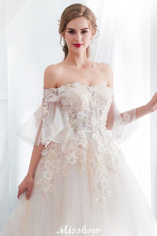 Vestido de novia de corte princesa, largo hasta el suelo, con apliques de tul y hombros descubiertos