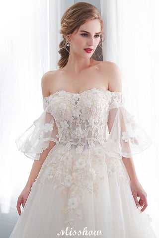 Vestido de novia de corte princesa, largo hasta el suelo, con apliques de tul y hombros descubiertos