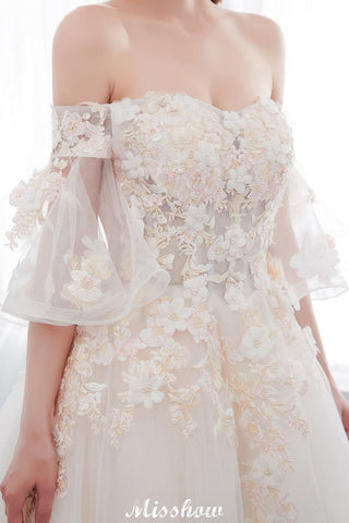 Vestido de novia de corte princesa, largo hasta el suelo, con apliques de tul y hombros descubiertos