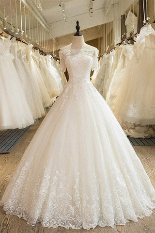 Robe de mariée en tulle et dentelle à épaules dénudées et manches 3/4