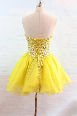 Robe de bal jaune en organza à décolleté cœur ornée de perles PG132