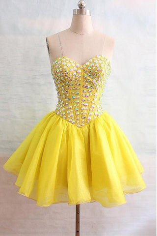Robe de bal jaune en organza à décolleté cœur ornée de perles PG132