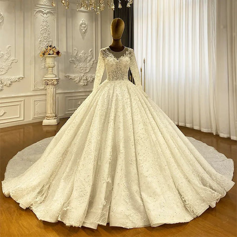 Vestido de novia de encaje estilo princesa, corte princesa, manga larga, con cola y corte en A.