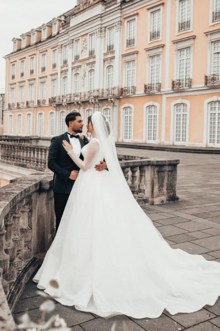Robe de mariée longue blanche de style princesse, coupe trapèze et manches longues