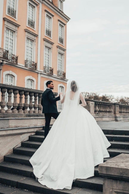 Robe de mariée longue blanche de style princesse, coupe trapèze et manches longues
