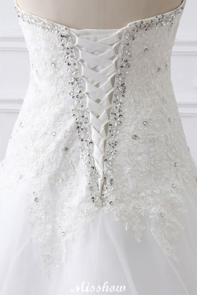 Robe de mariée princesse en tulle à décolleté cœur et dentelle