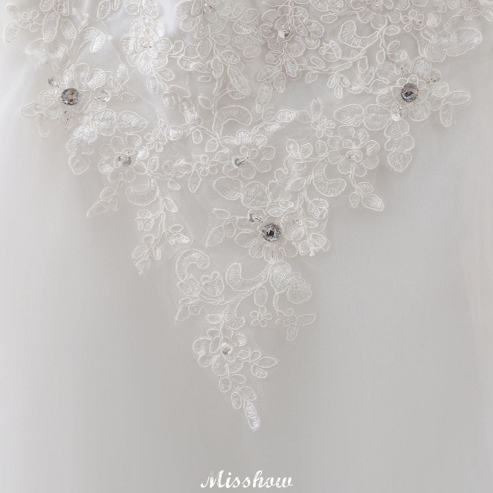 Robe de mariée princesse en tulle à décolleté cœur et dentelle