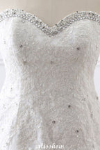 Robe de mariée princesse en tulle à décolleté cœur et dentelle