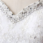 Robe de mariée princesse en tulle à décolleté cœur et dentelle