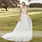 Baoleely Lakshmigown Spaghetti Straps Boho Wedding Dresses 2021 V Neck Backless Bohemian Lace Bride Dress Tulle Beach Bridal Gown